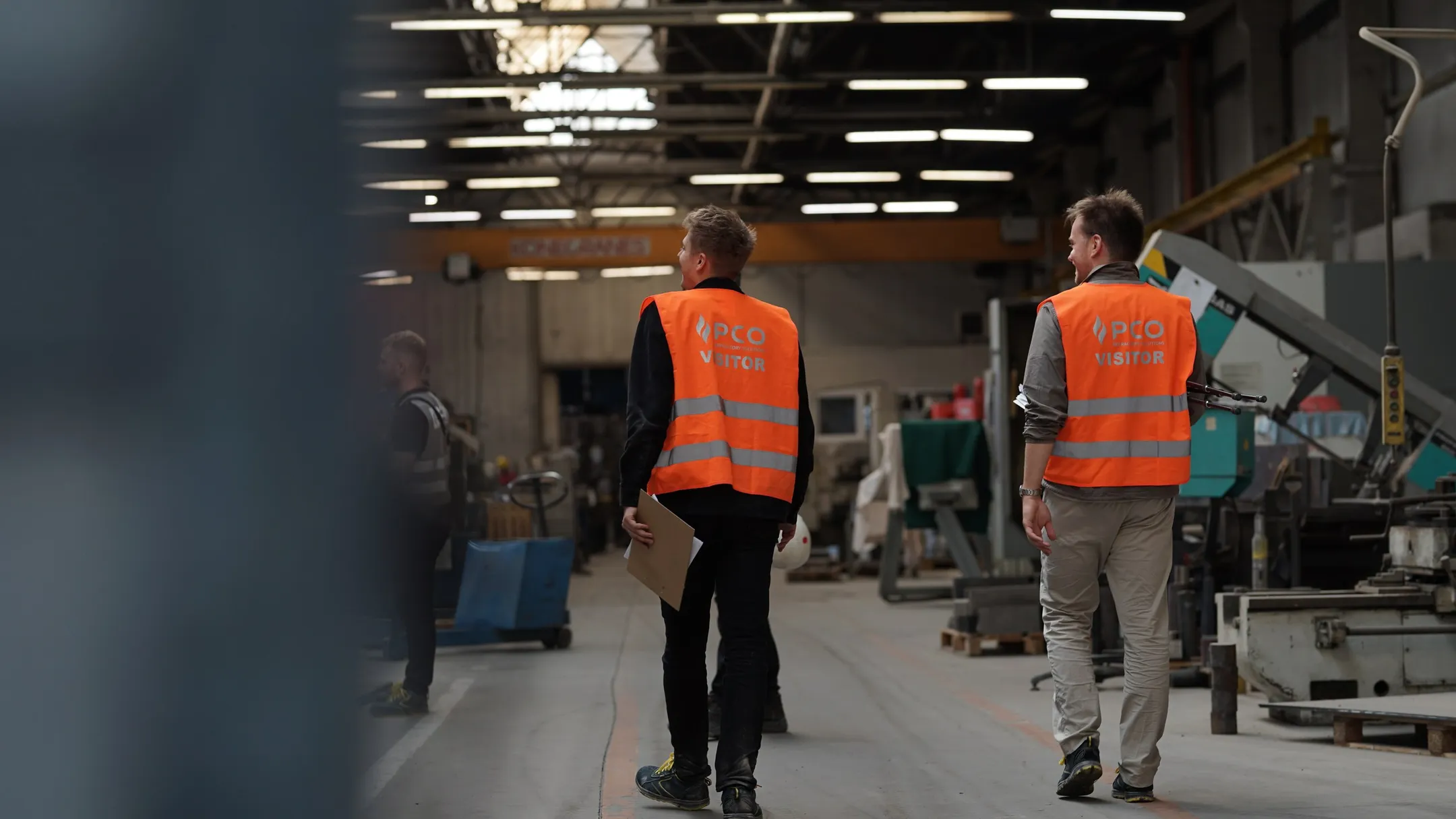 Our team walking the production hall with the script